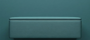 Storage ottoman with cushioned top, available in fabric, leather or synthetic upholstery