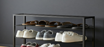 Functional shoe rack with multiple tiers, crafted from wood, plastic or metal