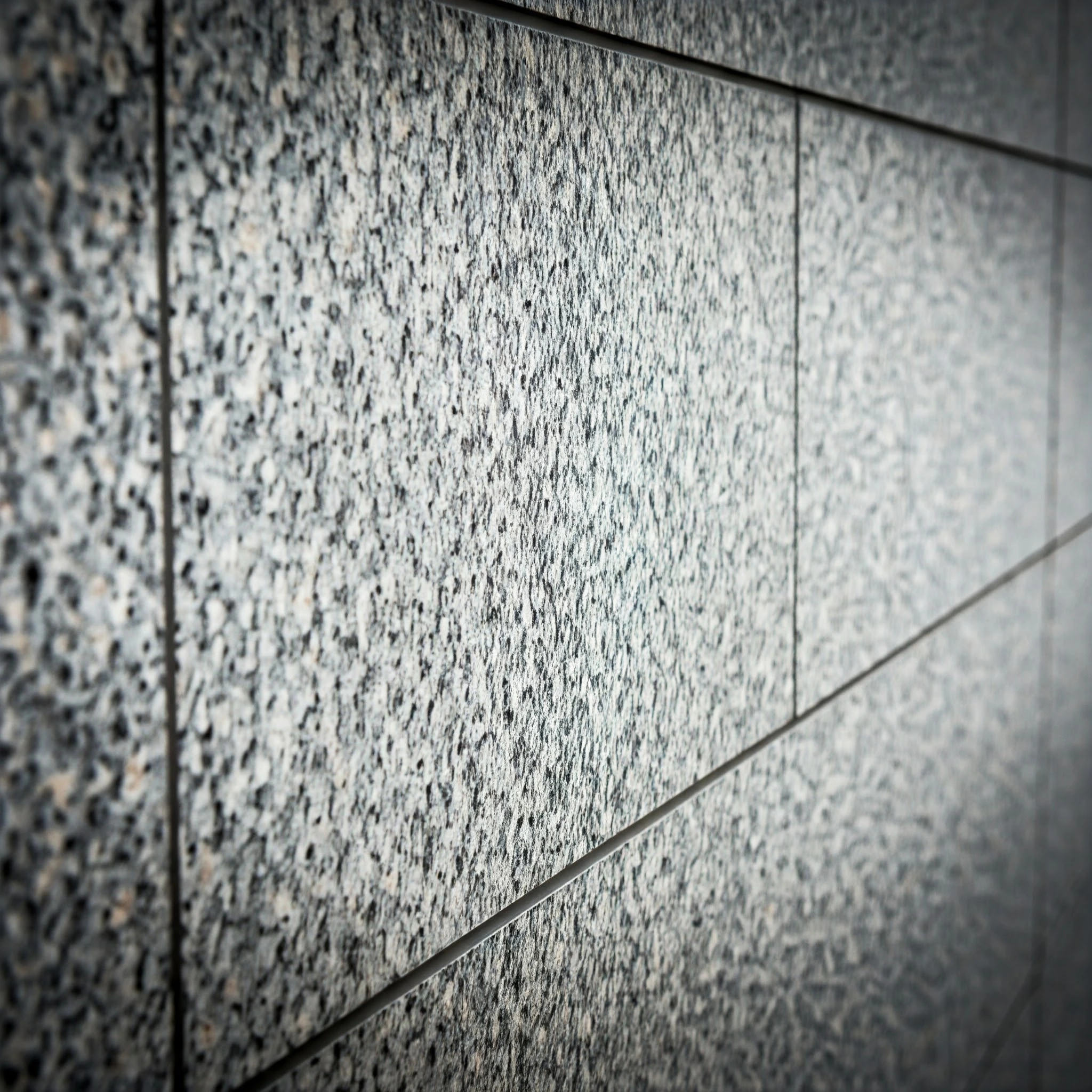 Granite wall cladding with a textured, natural stone finish
